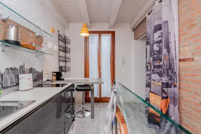 Cucina o angolo cottura di GuestHost - Giovanni's Home with balcony
