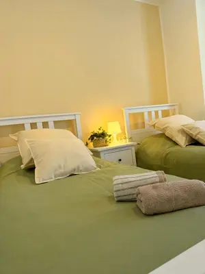 Letto o letti in una camera di Dimora Maria Elegant New Apartment with Free Parking