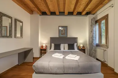 Letto o letti in una camera di Squero Aptm by WelcHome