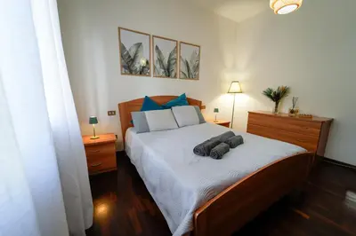 Letto o letti in una camera di Casa Delfina