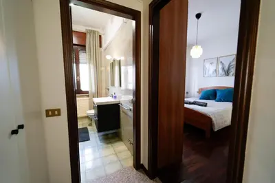 Letto o letti in una camera di Casa Delfina