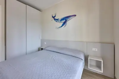 Letto o letti in una camera di La Posta
