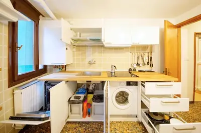 Cucina o angolo cottura di DolceVita Apartments N 530 San Marco