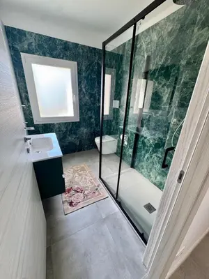 Letto o letti in una camera di Ai Portici Guest House