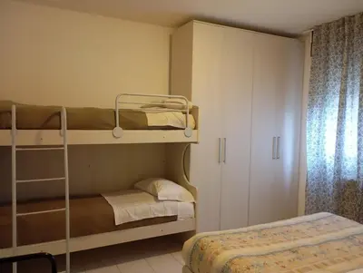 Letto o letti in una camera di Carinissimo vicino a Venezia