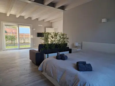 Letto o letti in una camera di Tiramisù incluso - by Flora