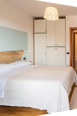 Letto o letti in una camera di Ca' Mami
