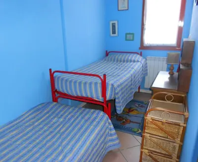 Letto o letti in una camera di Villa Caprera