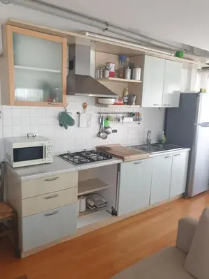 Cucina o angolo cottura di Attico Alghe Rosse Jesolo lido