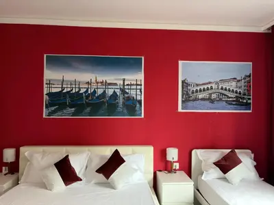 Letto o letti in una camera di Leone Di Venezia