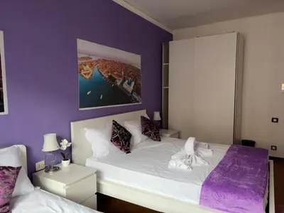 Letto o letti in una camera di Leone Di Venezia