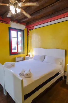 Letto o letti in una camera di Casa Bepi Burano