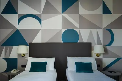 Letto o letti in una camera di Hotel Beatrice