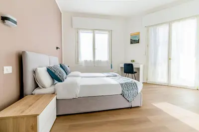 Letto o letti in una camera di Ipin Home