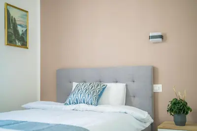 Letto o letti in una camera di Ipin Home