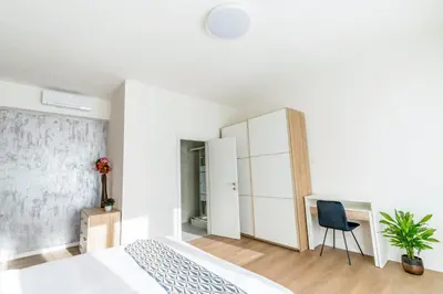 Letto o letti in una camera di Ipin Home
