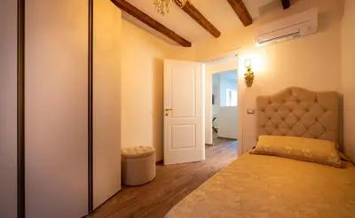 Letto o letti in una camera di Stylish & Cozy Venetian House