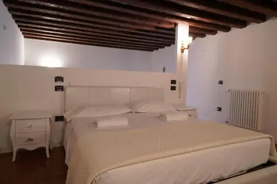 Letto o letti in una camera di Ca de la Cenise Apartment