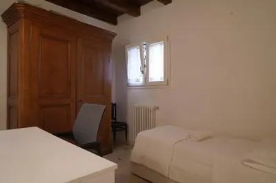 Letto o letti in una camera di Ca de la Cenise Apartment