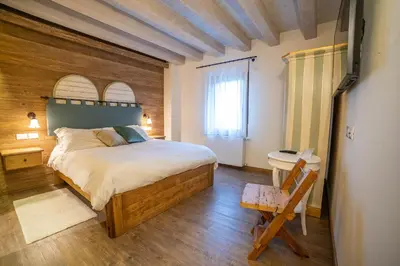 Letto o letti in una camera di Le Vigne Incantate