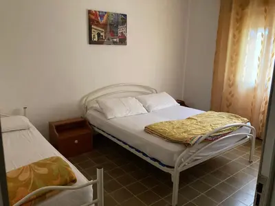Letto o letti in una camera di Sabrina