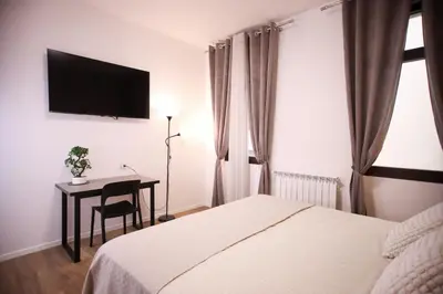 Letto o letti in una camera di Casa Grande Centro Padova