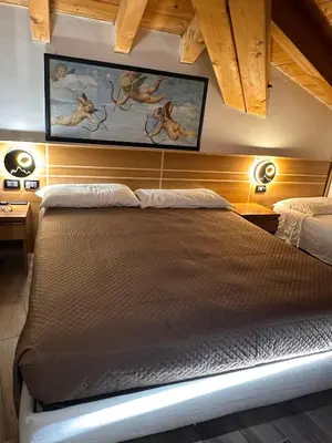 Letto o letti in una camera di Hotel Oasi
