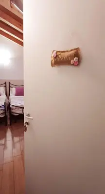 Letto o letti in una camera di B&B Al sogno di Laura