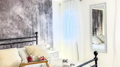 Letto o letti in una camera di Residenza I Dogi by Ca-Sa Check
