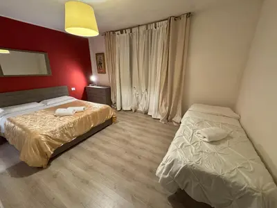 Letto o letti in una camera di Sun Moon Venice Harrysclass