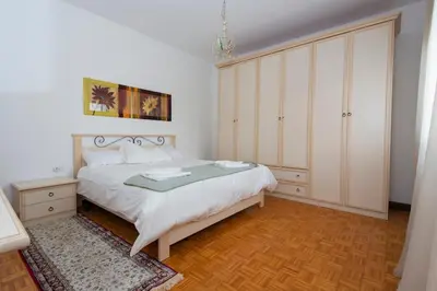 Letto o letti in una camera di Bright with 2 Terraces and PS5, Near the Center