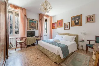 Letto o letti in una camera di VeNICe Cera Casa Del Sol