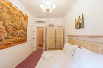 Letto o letti in una camera di VeNICe Cera Casa Del Sol