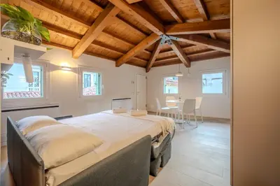 Letto o letti in una camera di La Cereria Design Flats - Il Gioielliere
