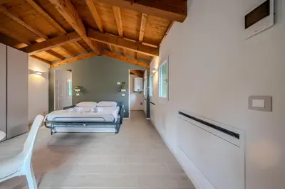 Letto o letti in una camera di La Cereria Design Flats - Il Gioielliere