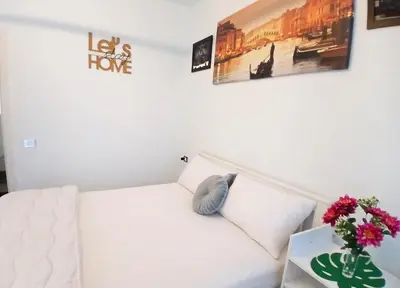 Letto o letti in una camera di Om House Venezia