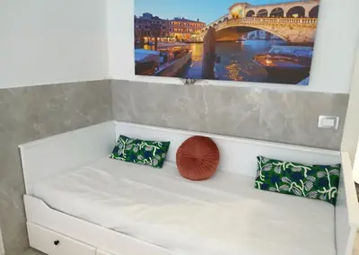 Letto o letti in una camera di Om House Venezia