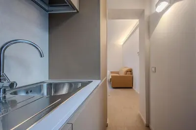 Cucina o angolo cottura di La Cereria Design Flats - L'Orefice