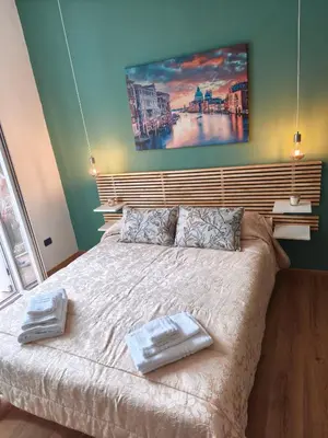 Letto o letti in una camera di YourHomeinVenice
