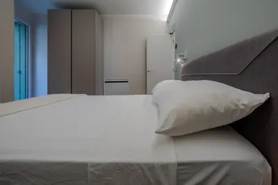Letto o letti in una camera di La Cereria Design Flats - Il Cesellatore