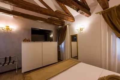 Letto o letti in una camera di Cà de l'oca 4327 in The Heart of Venice