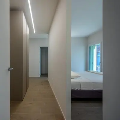 Letto o letti in una camera di La Cereria Design Flats - Il Pelliciaio