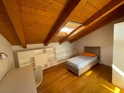Letto o letti in una camera di Treviso Apartment - Ghirada