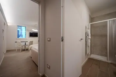 Letto o letti in una camera di The Cereria Design Flats - Il Ceraiolo Pet Free