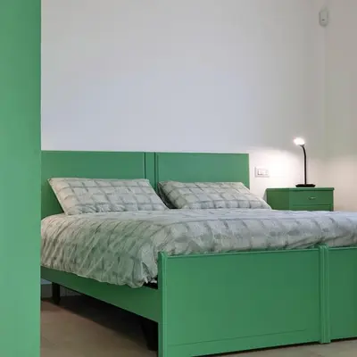 Letto o letti in una camera di Dai Freschi - Casa in campagna a Trevignano