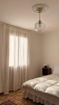 Letto o letti in una camera di Villa Maison Ellen - Luxury Garden, Colli Euganei