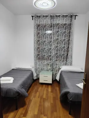 Letto o letti in una camera di Villa Bazzera