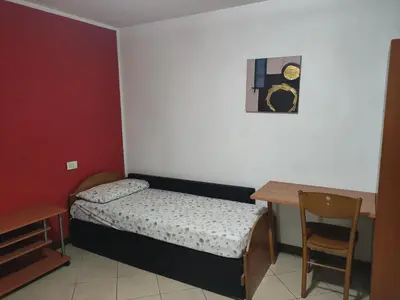 Letto o letti in una camera di Vicenzahappyhome