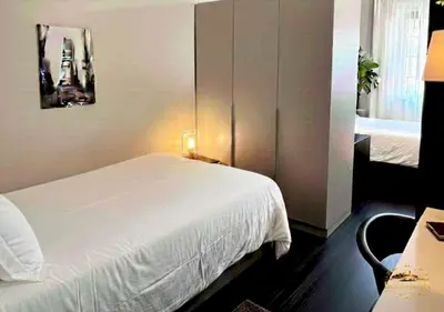 Letto o letti in una camera di Bellavista Residence