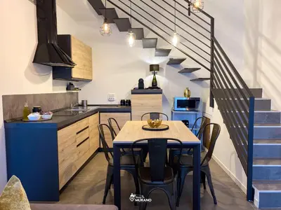 Area soggiorno di CRISTAL House by Sleep in Murano